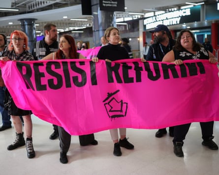 Protesters from Climate Resistance brandished a ‘Resist Reform’ banner in the building where the conference is taking place.Photograph: Isabel Infantes/Reuters