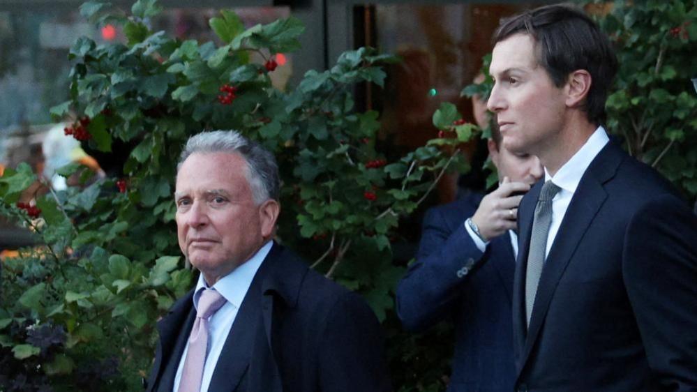 Image caption,Jared Kushner (left) and Steve Witkoff (right) pictured with Russia's Kirill Dmitriev (centre) on arrival in Moscow
