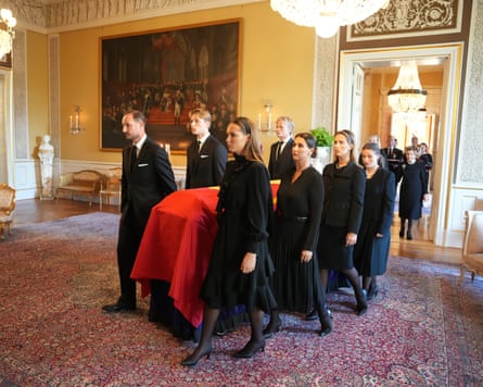 King Harald V’s coffin is carried to Oslo’s Palace Chapel by members of the royal family including (at front) Haakon VIII and Queen Mette-Marit.Photograph: Ole Berg-Rusten/EPA