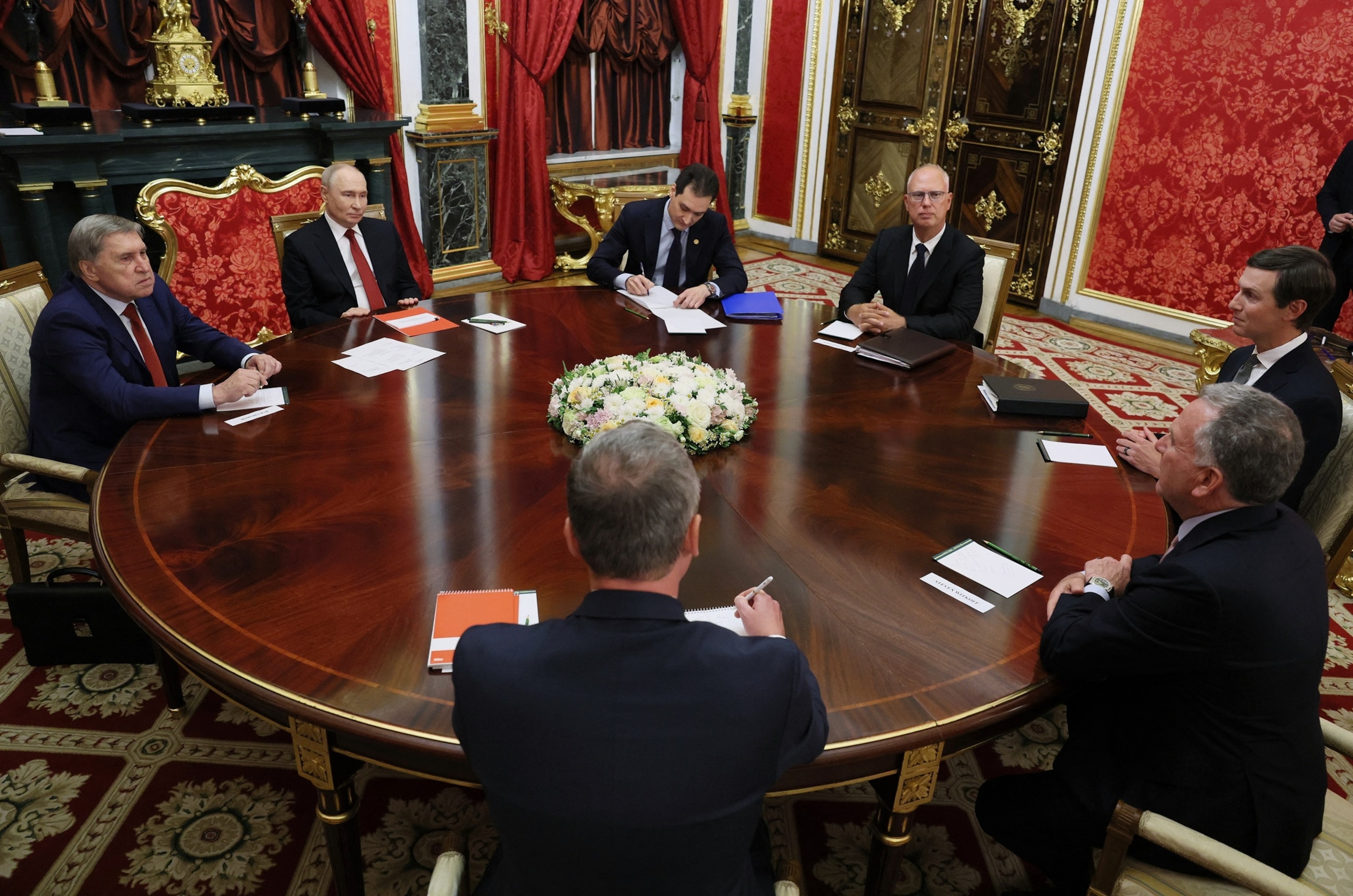 In this pool photograph distributed by the Russian state agency Sputnik, Russia's President Vladimir Putin (2nd L), Kremlin foreign policy aide Yuri Ushakov (L) and Russia's presidential envoy Kirill Dmitriev (4th L) attend a meeting with US special envoy Steve Witkoff (R) and US President Donald Trump's son-in-law Jared Kushner (2nd R) in Moscow on September 5, 2026. Russian President Vladimir Putin met with US envoys Steve Witkoff and Jared Kushner on September 5, 2026 for talks on ending more than four years of war in UkraineMikhail Metzel, Pool via AFP via Getty Images