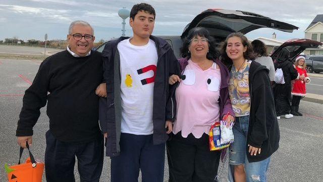 Image caption,Michael, second from left, is 5'10, 200-plus pounds and nonverbal, needing 24/7 care