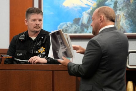 Chief deputy district attorney Marc DiGiacomo questions Jeffrey Scott, a senior crime scene analyst for the Las Vegas Metropolitan police department, during the trial for Duane Davis in Las Vegas on 25 August.Photograph: John Locher/Pool via Reuters