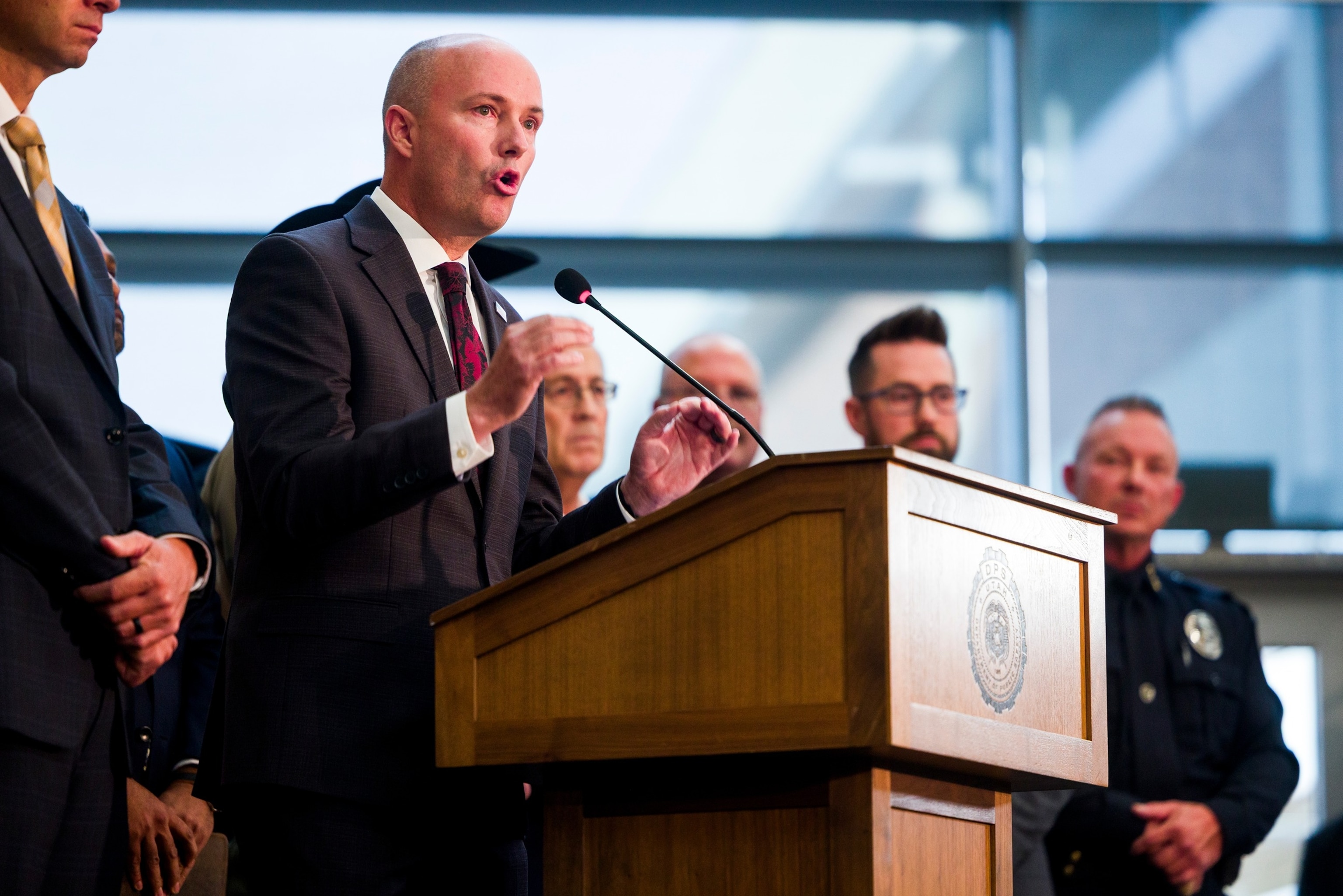 Utah Gov. Spencer Cox speaks at a press conference flanked by FBI director Kash Patel following the fatal shooting of political activist Charlie Kirk during an event at Utah Valley University on September 12, 2025 in Orem, Utah. Authorities announced that the suspect who shot and killed Kirk while he was speaking at an event for his "American Comeback Tour" has been apprehended and is in police custody.Michael Ciaglo/Getty Images