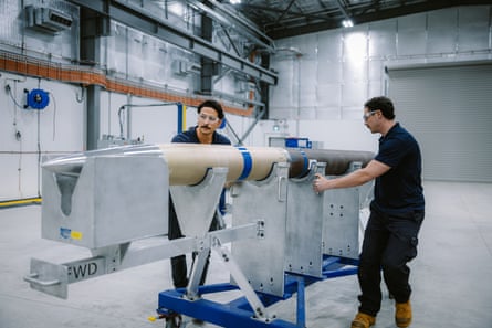 Workers with a missile at the Port Wakefield facility.Photograph: Lockheed Martin