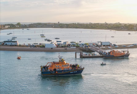 Police at the site of a far-right protest in Portsmouth on Sunday night, following the arrival of a migrant boat.Photograph: Supplied