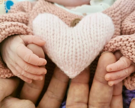 Chiara in the arms of her mother, Susan Cacciacarro.Photograph: Susan Cacciacarro