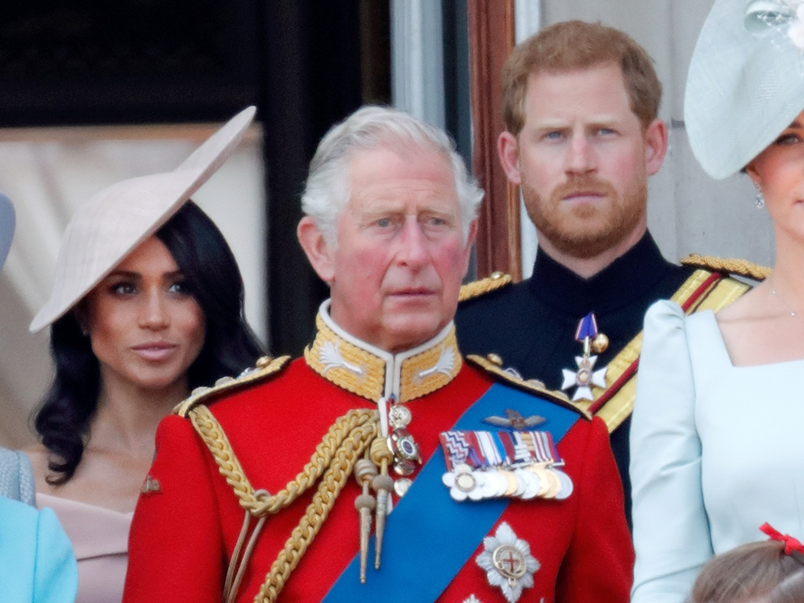 Meghan, Duchess of Sussex, Prince Charles, Prince of Wales and Prince Harry, Duke of Sussex stand on the balcony of Buckingham Palace during Trooping The Colour 2018, June 9, 2018, in London.Max Mumby/indigo/Getty Images