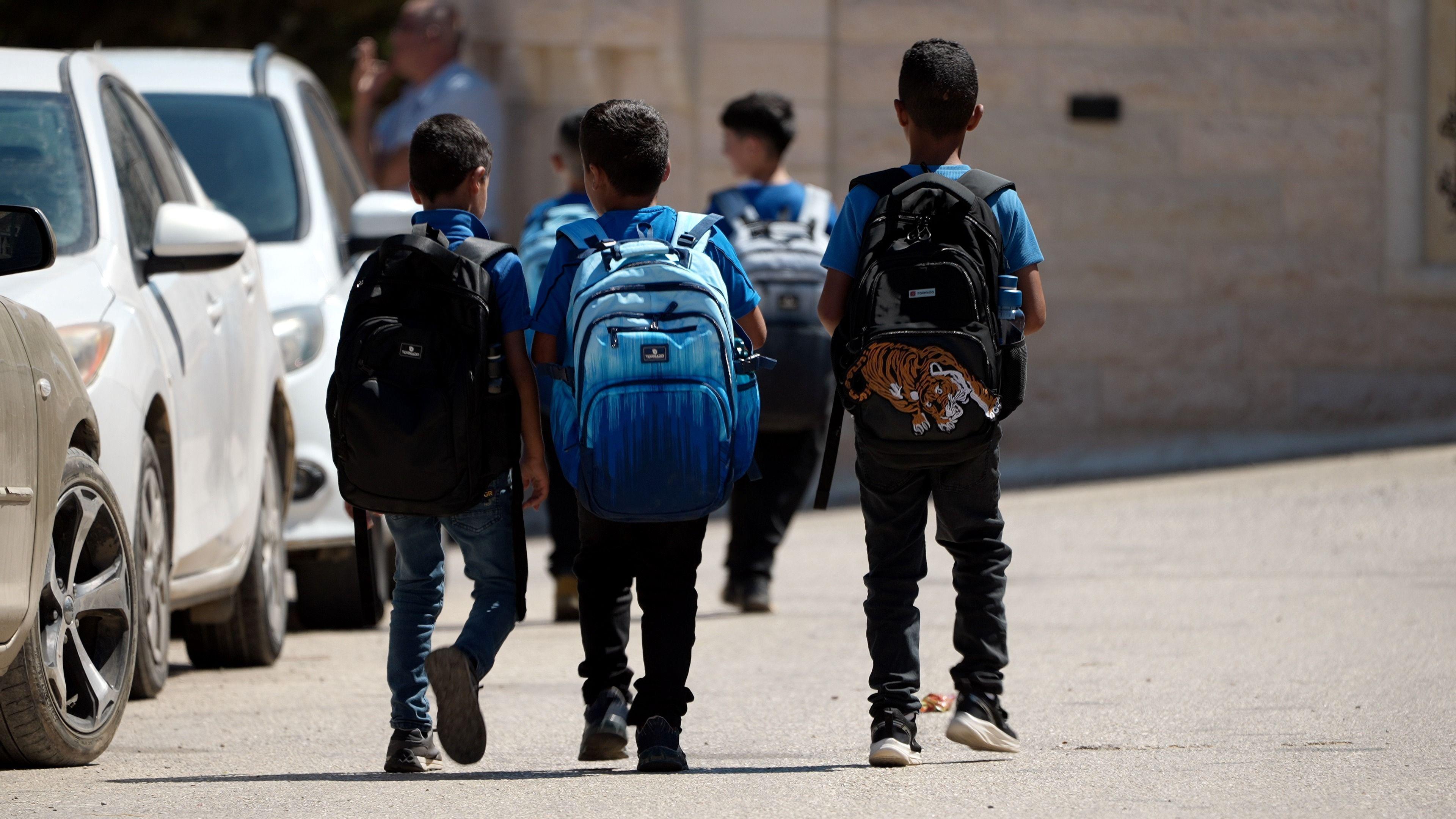 Image caption,Ambulance crews have been stationed on the road outside the school, while several parents have volunteered to stand outside the gates