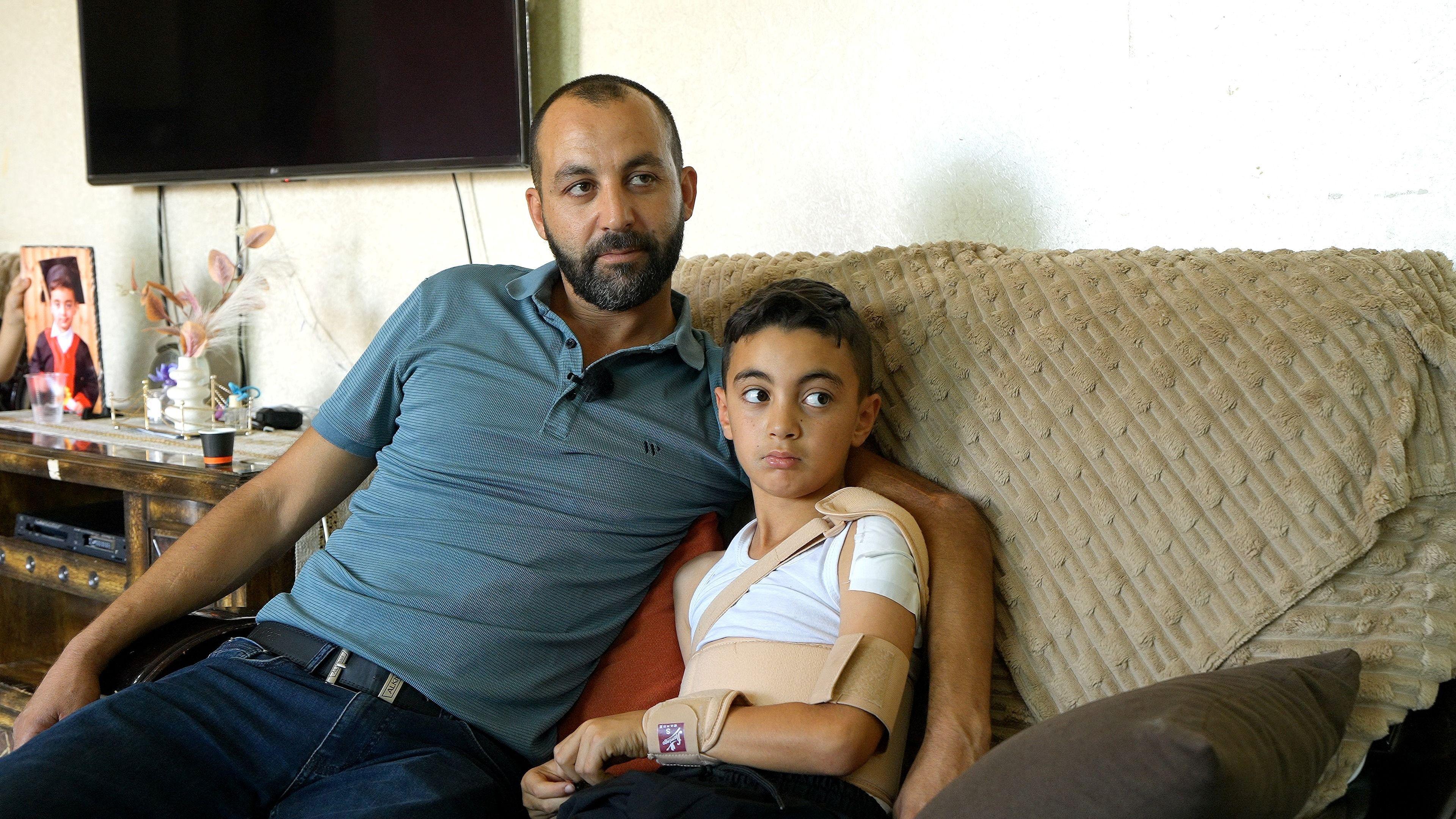 Image caption,Sami's son, Salim, was shot while playing with friends in July