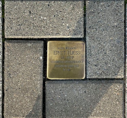 The memorial stone of Ernst Fliess, a Jewish lawyer hounded to his death by the Nazis.Photograph: Kate Connolly/The Guardian