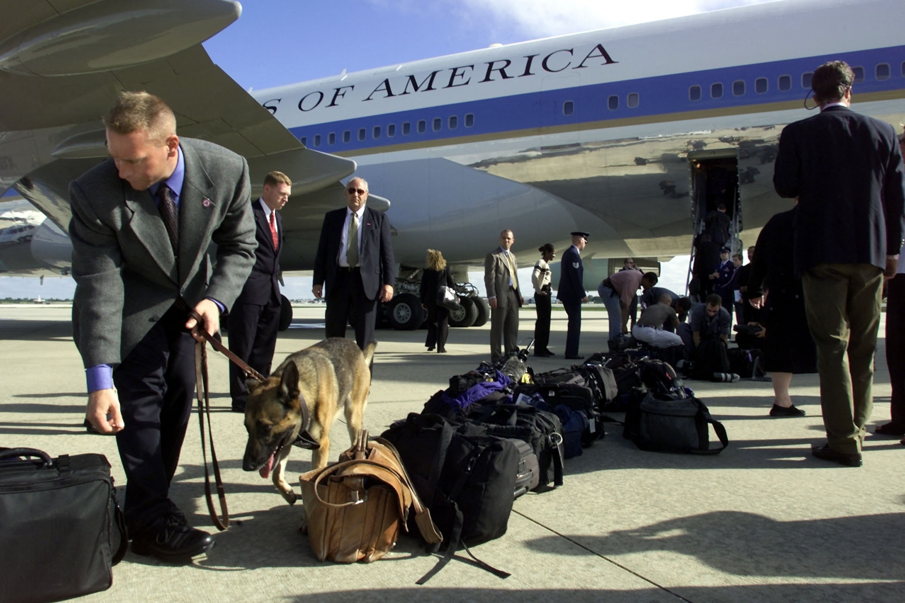 US Secret Service and Military Police check passengers belongings before boarding Air Force One, September 11, 2001 as President George W. Bush departs Sarasota, Florida.Paul J. Richards/AFP via Getty Images