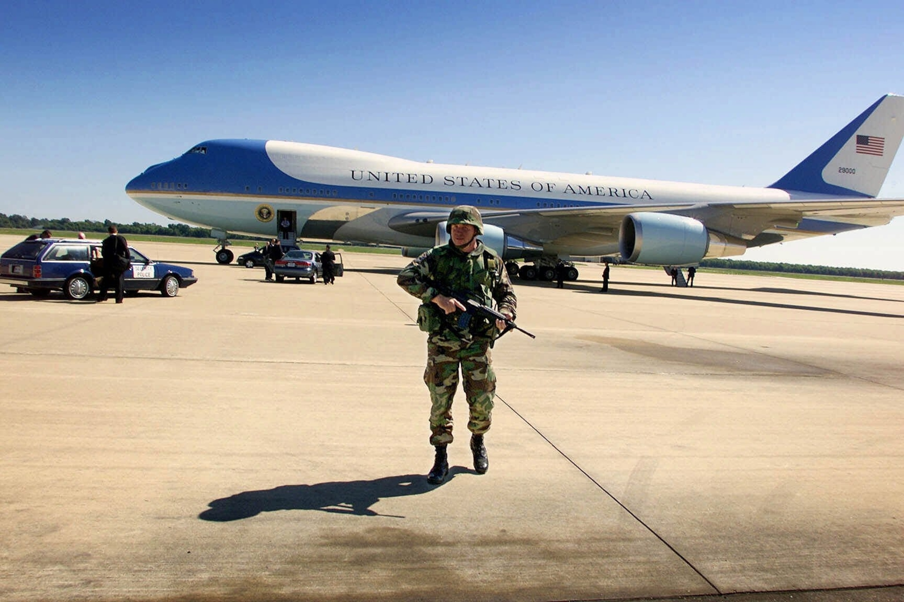 Air Force One sits on the tarmack under tight military security just after President Bush arrived to address the nation from Barksdale Air Force Base, La., Sept. 11, 2001.Doug Mills/AP Photo