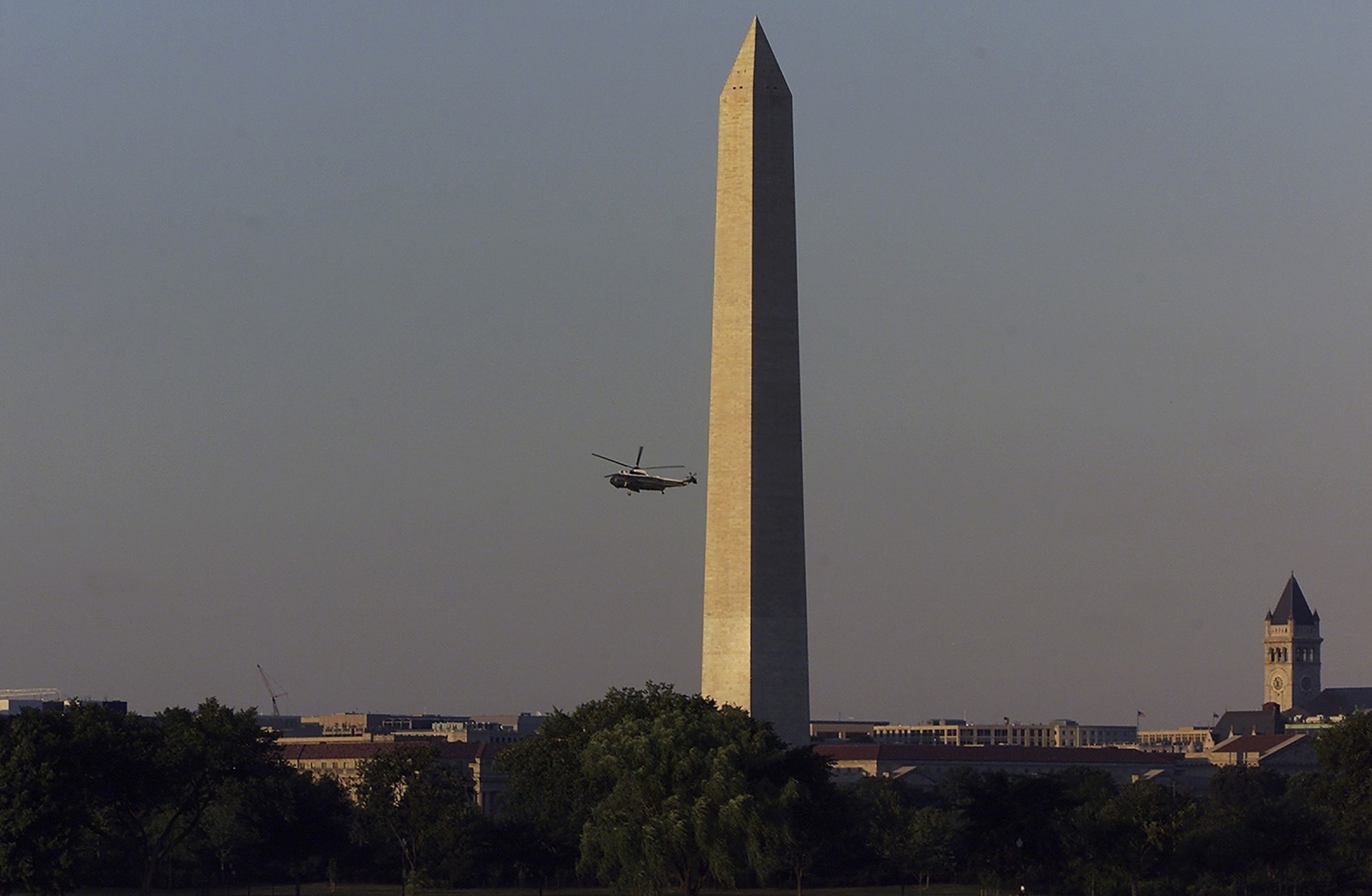 Marine One, carrying President Bush, flies past the Washington Monument Tuesday, Sept. 11, 2001, as he returns to the White House.Hillery Smith Garrison/AP Photo