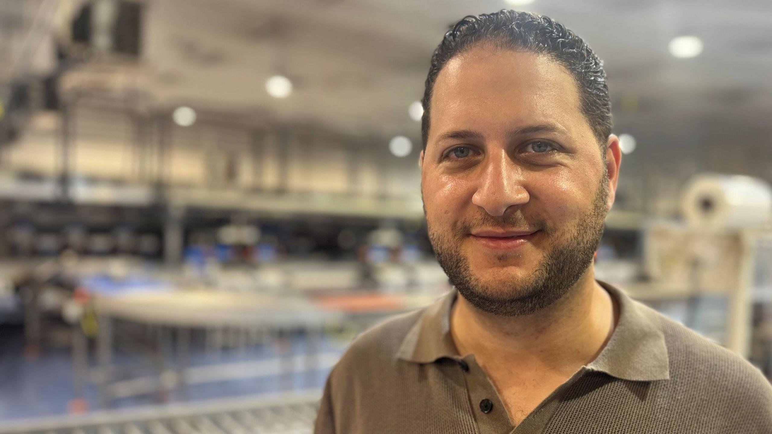 Image caption,Palestinian exporter Momen Sinokrot believes sanctions could help curb settlement growth