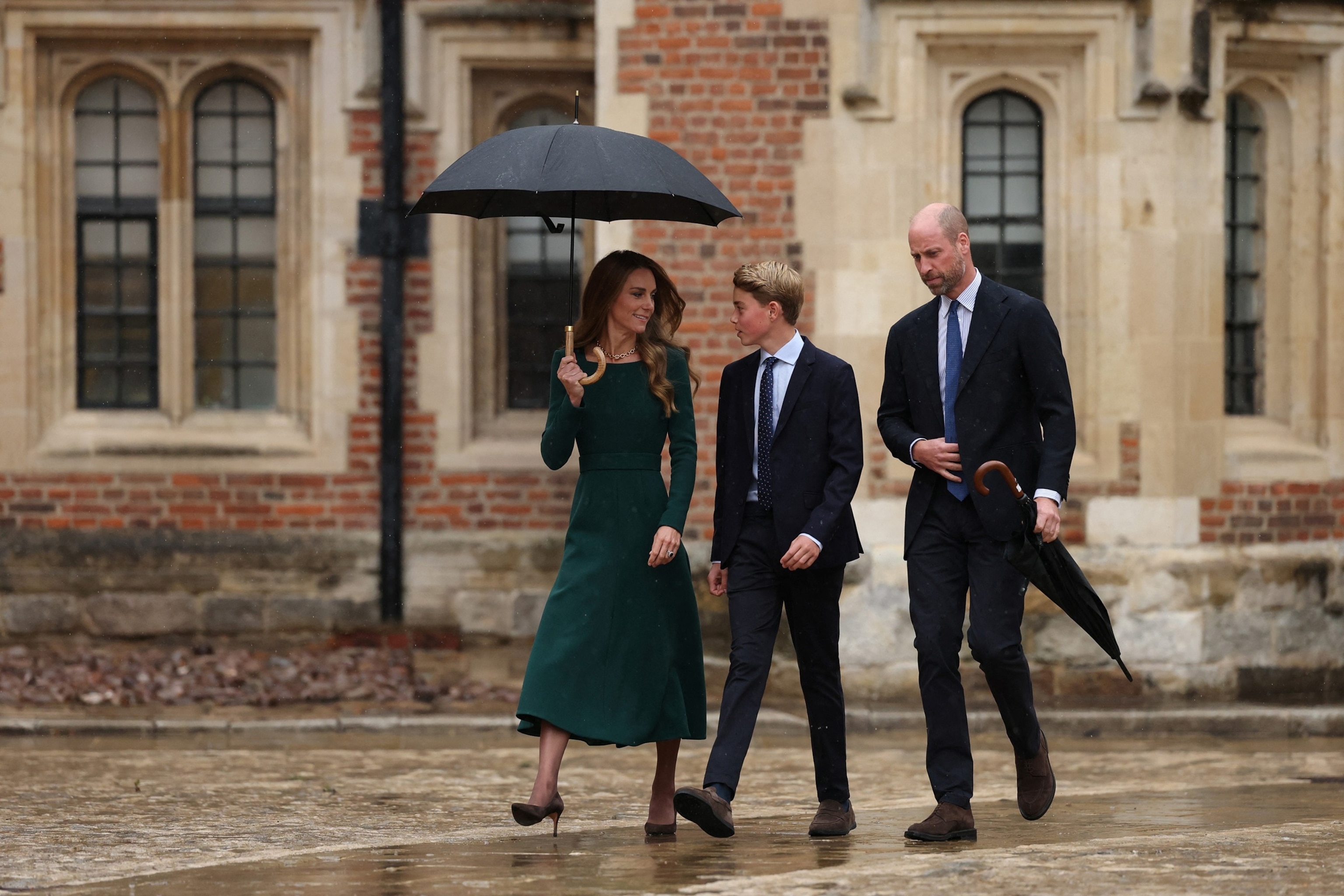 Catherine, Princess of Wales and Prince William, walk with their son, Prince George of Wales, 13, as he arrives for his first day at Eton College, in Eton, west of London, September 8, 2026.Adrian Dennis/POOL/AFP via Getty Images