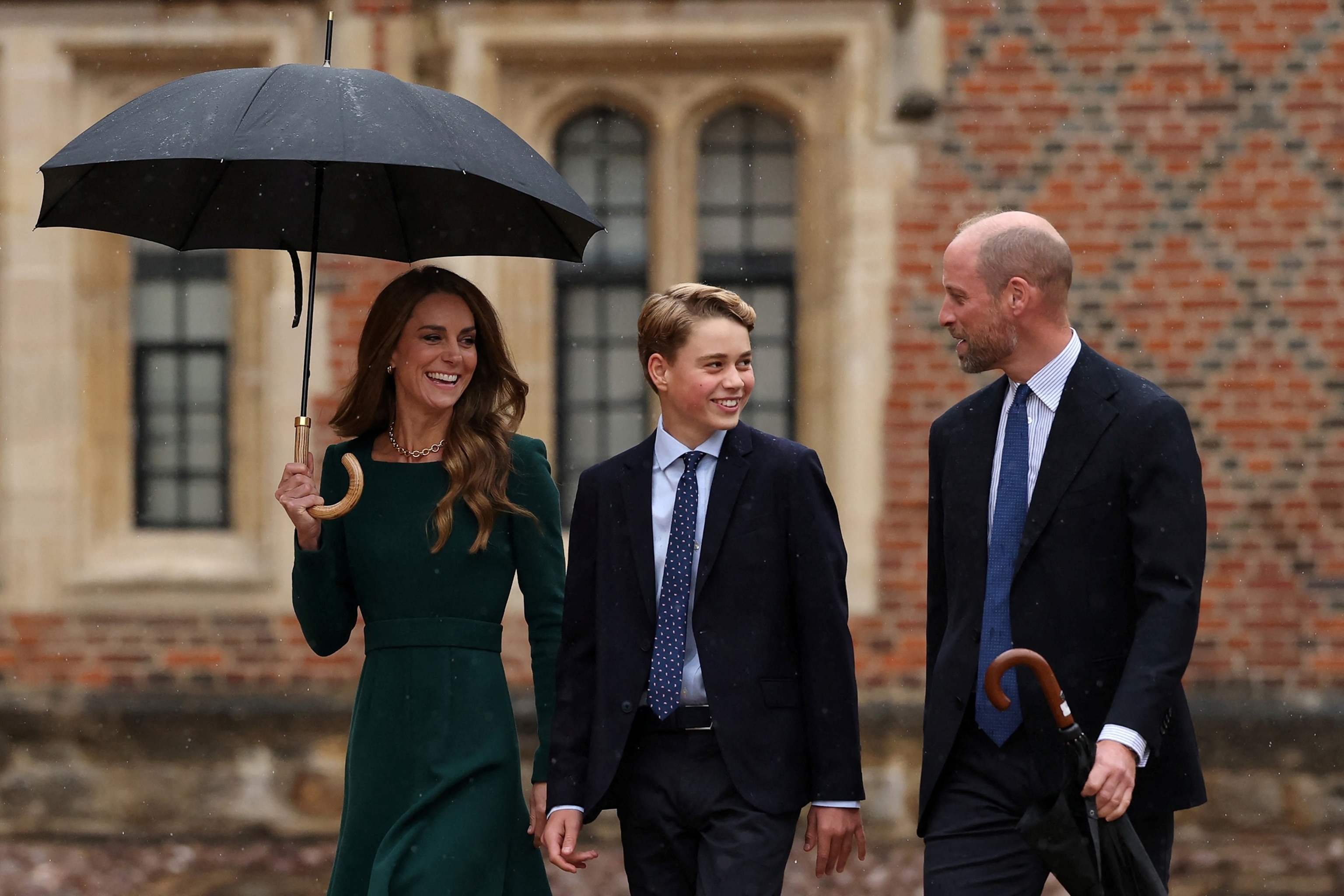Catherine, Princess of Wales and Prince William, walk with their son, Prince George of Wales, 13, as he arrives for his first day at Eton College, in Eton, west of London, September 8, 2026.Adrian Dennis/POOL/AFP via Getty Images