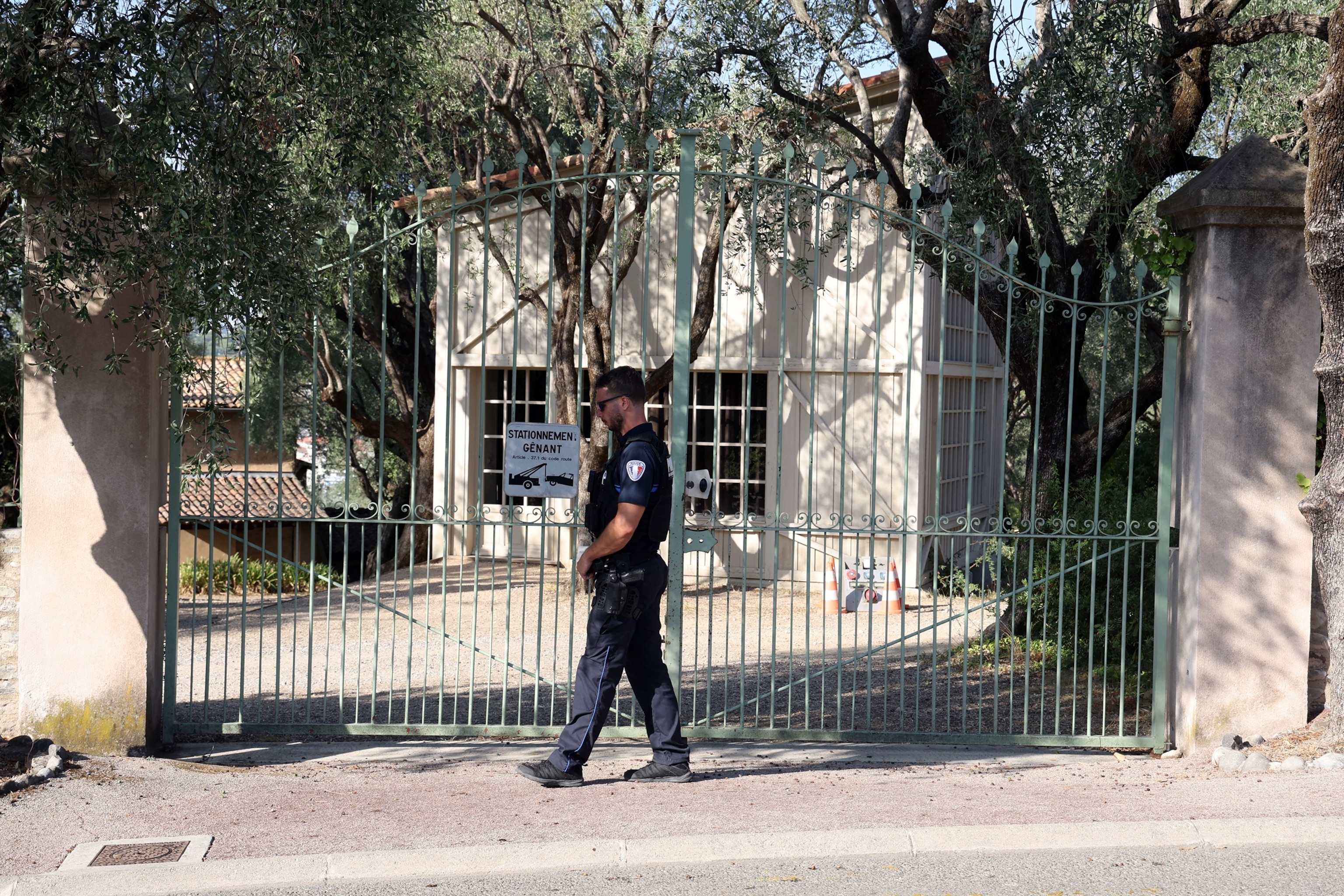 A police officer patrols in front of the entrance of the Musee Renoir after four paintings were stolen from the museum in an early-morning break-in, with two suspects still at large, in Cagnes-sur-Mer on Sept. 8, 2026.Valery Hache/AFP via Getty Images