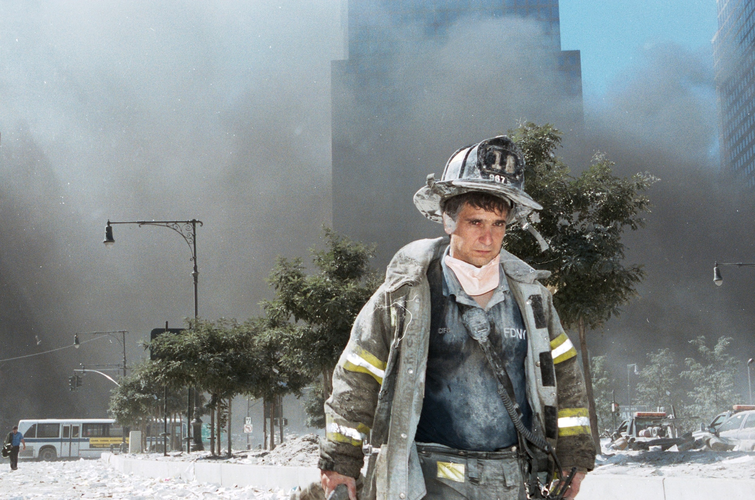 A New York City firefighter walks away from Ground Zero after the collapse of the Twin Towers September 11, 2001 in New York City.Anthony Correia/Getty Images