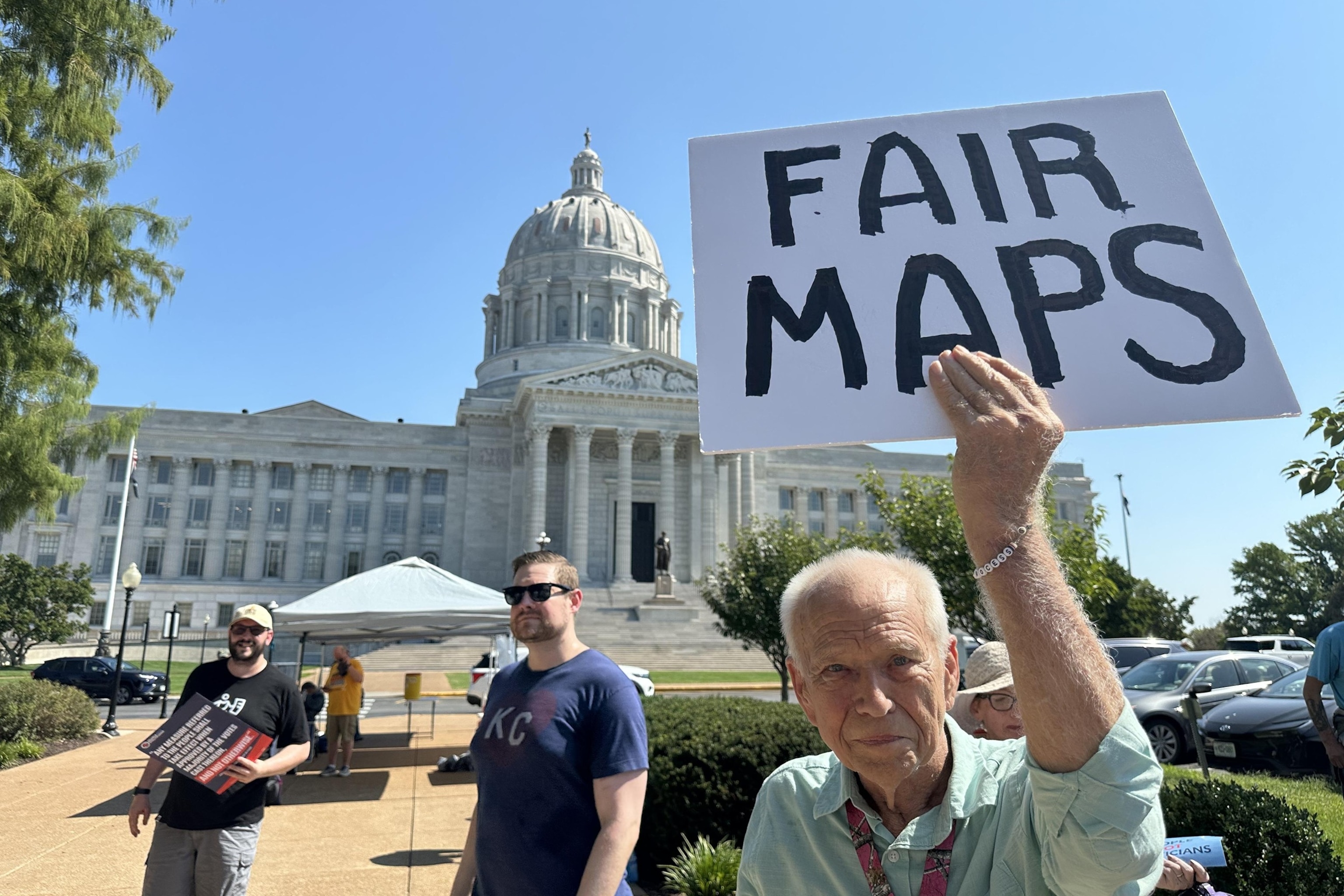 Steve Perry, of Kansas City, holdis a sign in opposition to Missouri's congressional redistricting plan, Sept. 2, 2026, outside the state Capitol, in Jefferson City, Mo.David A. Lieb/AP
