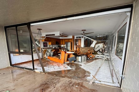Damage caused by Hurricane Lowell in Poʻipū on Kauaʻi’s south shore, in Hawaii.Photograph: Guy Miller/Honolulu Civil Beat via AP